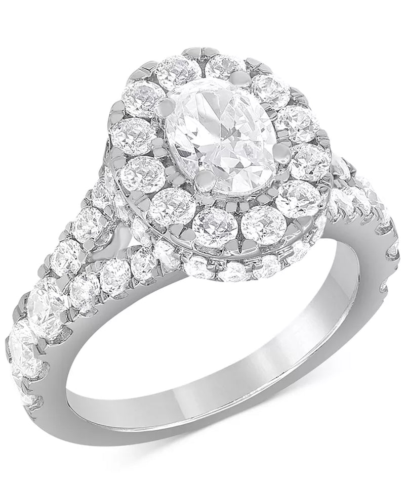 Stunning 4 Ct. T.W. Diamond Oval Halo Bridal Set in Elegant 14K White Gold