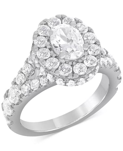 Stunning 4 Ct. T.W. Diamond Oval Halo Bridal Set in Elegant 14K White Gold