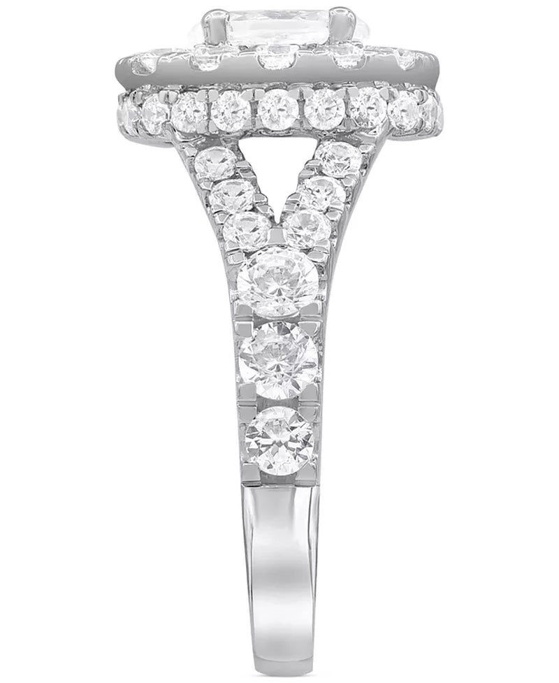 Stunning 4 Ct. T.W. Diamond Oval Halo Bridal Set in Elegant 14K White Gold