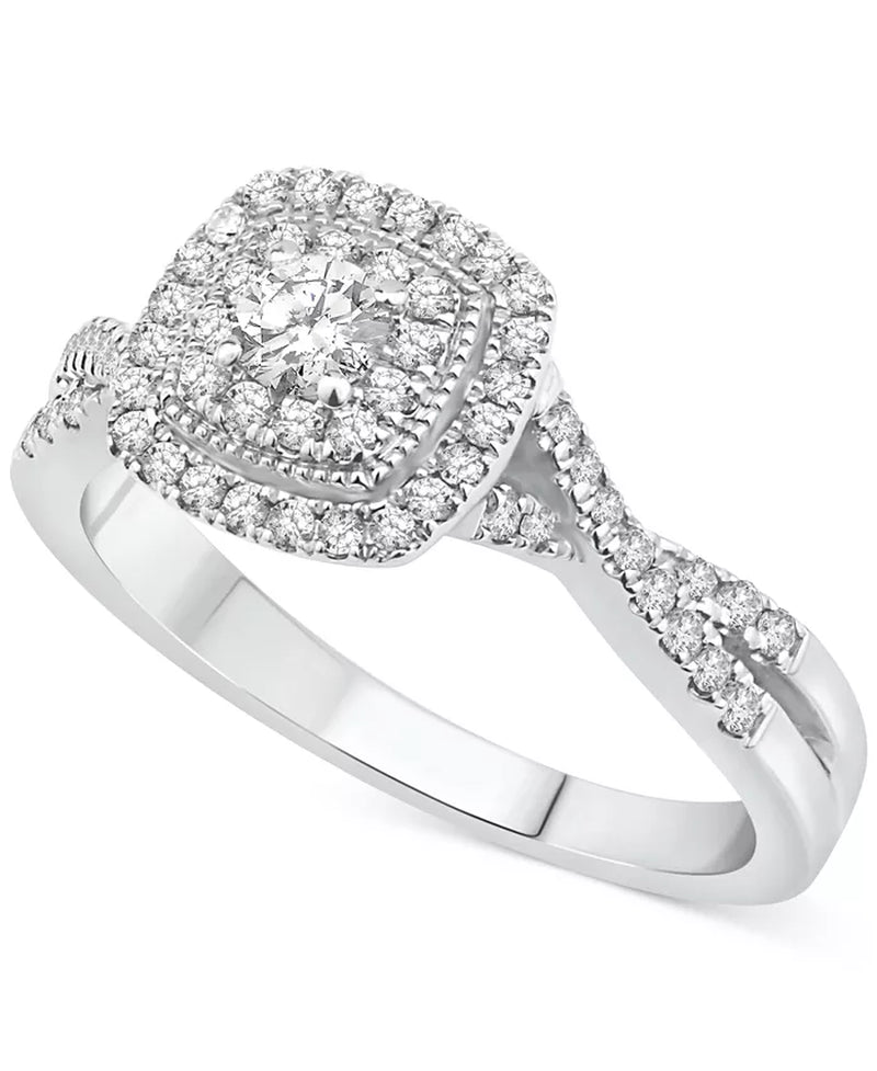 Stunning 5/8 Ct. T.W. Diamond Cushion Halo Twist Bridal Set in Luxurious 14K White Gold