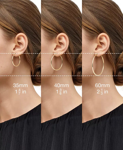 Stunning Nude Diamond Teardrop Spiral Hoop Earrings in 14K Rose Gold - 1.5 Ct. T.W.
