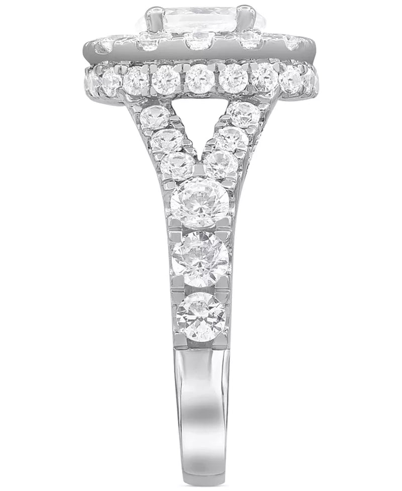 Stunning 4 Ct. T.W. Diamond Oval Halo Bridal Set in Elegant 14K White Gold