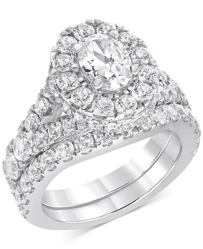 Stunning 4 Ct. T.W. Diamond Oval Halo Bridal Set in Elegant 14K White Gold