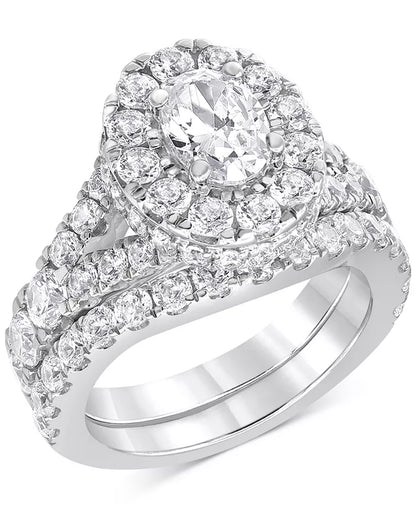 Stunning 4 Ct. T.W. Diamond Oval Halo Bridal Set in Elegant 14K White Gold