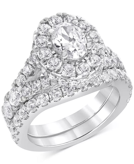 Stunning 4 Ct. T.W. Diamond Oval Halo Bridal Set in Elegant 14K White Gold