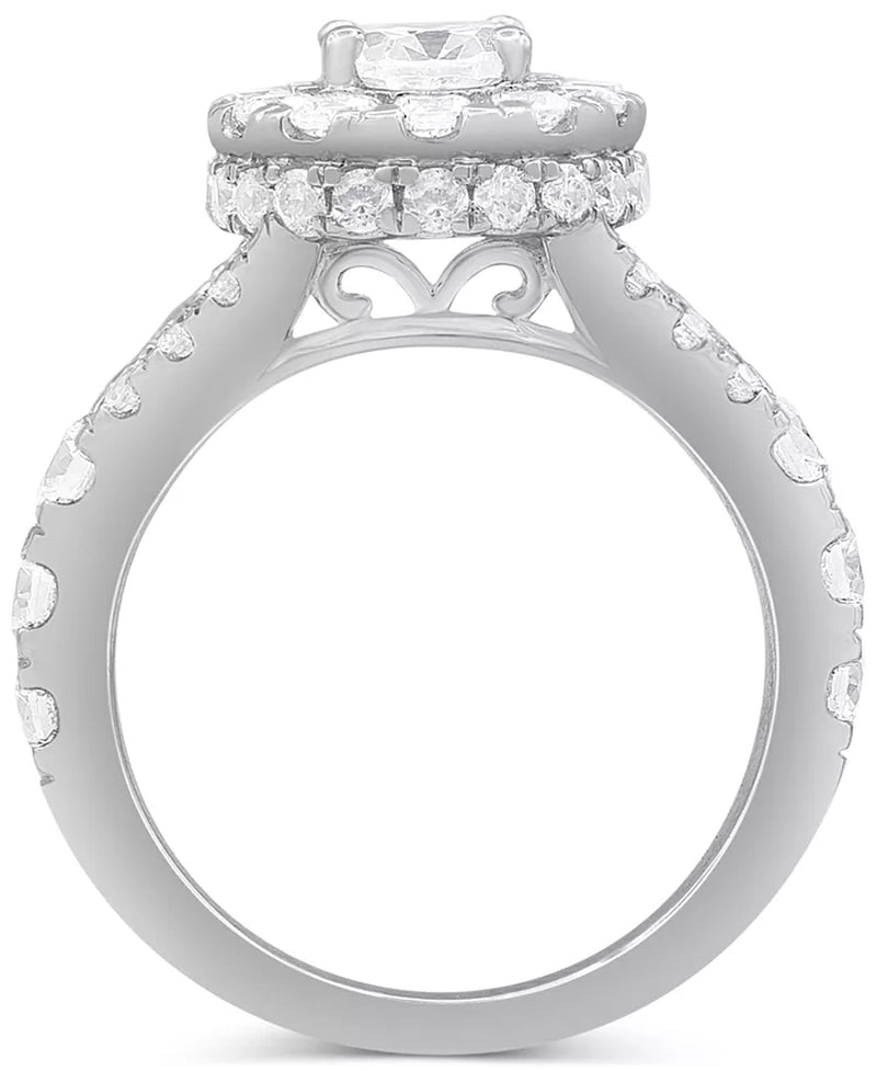 Stunning 4 Ct. T.W. Diamond Oval Halo Bridal Set in Elegant 14K White Gold