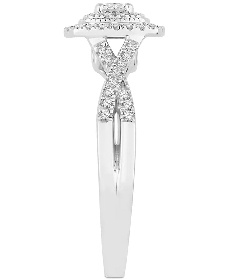 Stunning 5/8 Ct. T.W. Diamond Cushion Halo Twist Bridal Set in Luxurious 14K White Gold