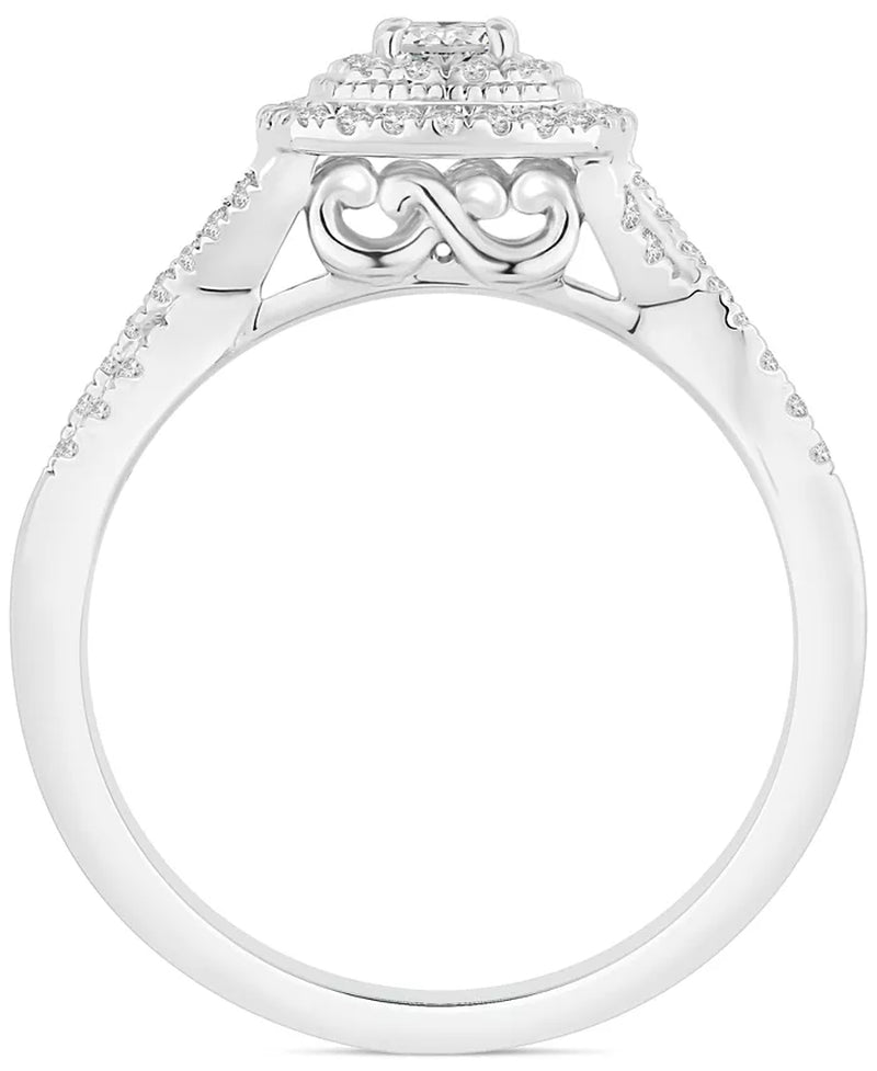 Stunning 5/8 Ct. T.W. Diamond Cushion Halo Twist Bridal Set in Luxurious 14K White Gold