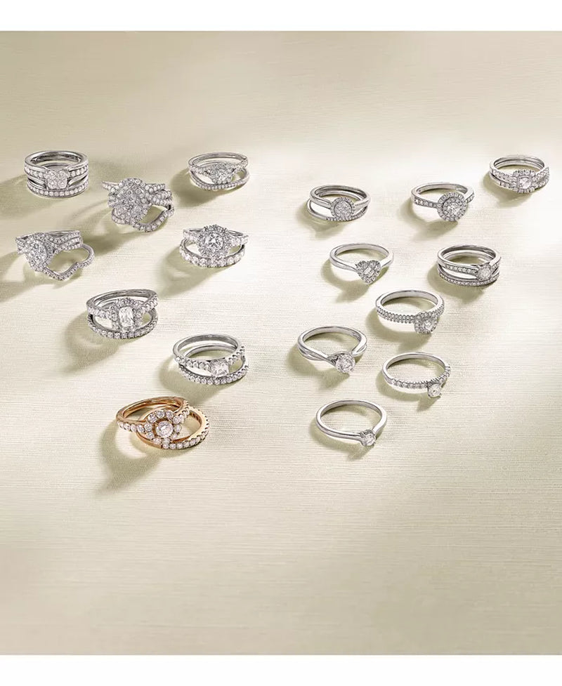 Stunning 1/2 Ct. T.W. Diamond Halo Engagement Ring in Elegant 14K White Gold